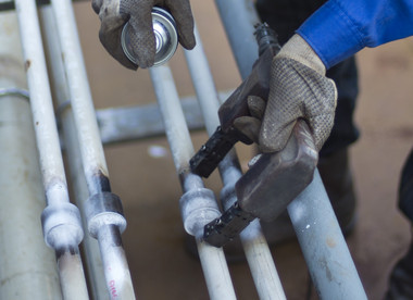 Magnetic particle inspection of a ferrous component